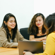 Outsourcing Administration – What You Need to Know group of women working and discussing