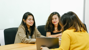 group of women working and discussing