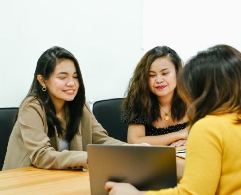 group of women working and discussing