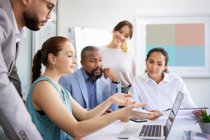 people at work discussing plans, meeting at work