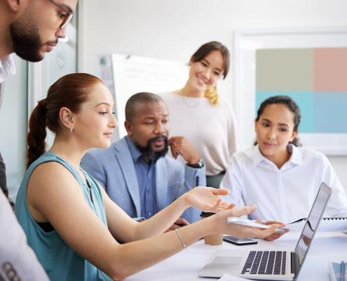people at work discussing plans, meeting at work