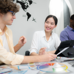 Freelancers vs Full-Time Employees in Outsourcing: Which is Right for Your Business? people discussing in office