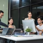 Business team working on a project in the office or reviewing