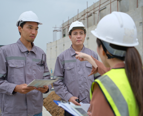construction workers reporting to boss